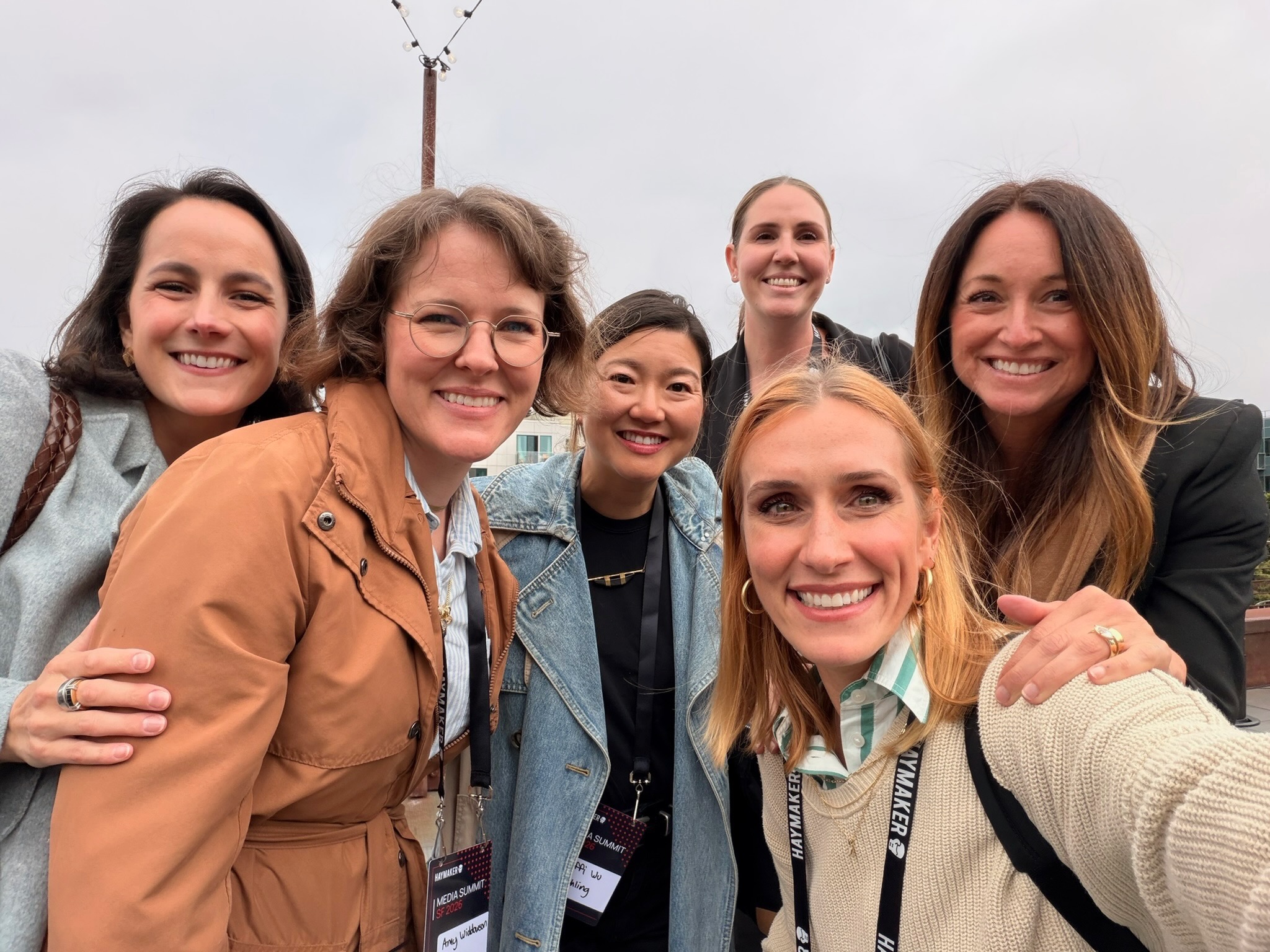 Six Off the Record members taking a group selfie in San Francisco